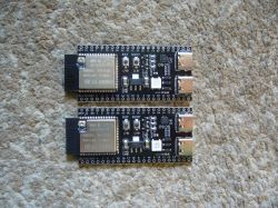 Two Sparkle IoT XH-S3E modules with N16R8 WiFi+BT chips on carpet