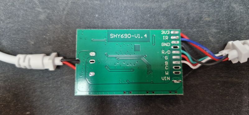 LED strip controller circuit board with connector labels.