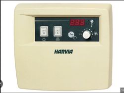 Harvia control panel with heating and lighting buttons and a temperature dial.