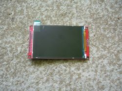 3.5-inch color LCD screen on red PCB with labeled signal pins