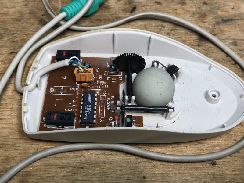 Interior of an Old Ball Mouse Interior of an old ball mouse showing the mechanism.