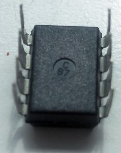 Image of an ATtiny13A microcontroller with markings on the top surface.