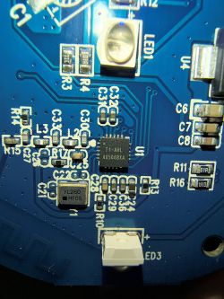 Close-up of PCB with T1-AHL AU5068XA chip and surface-mount components