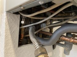 Section of Junkers ZSR 18-5 KE boiler with visible pipes and installation.