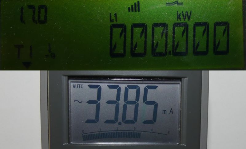 Dwa elektroniczne wyświetlacze z odczytami liczników energii i miernika prądu.