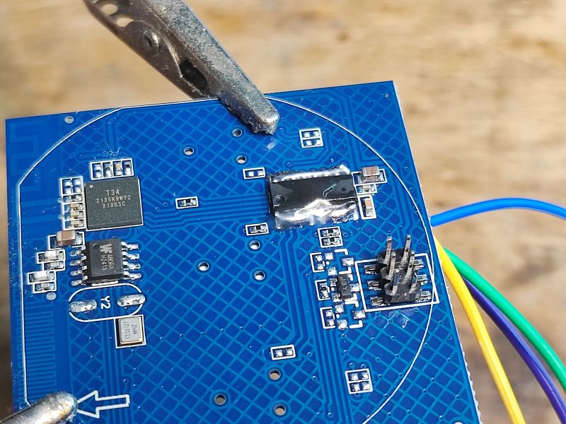 QTouch PCB with Integrated Circuits Printed circuit board with integrated circuits, visible wires and connectors.