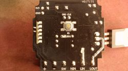 Black PCB with K1 push button and pin labels: 3V3, GND, SW, LIN, LOUT