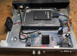 Samsung EVO 4TB SSD installed inside a metal electronic device housing.