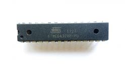 Close-up of ATmega328P-PU microcontroller with manufacturer's markings.