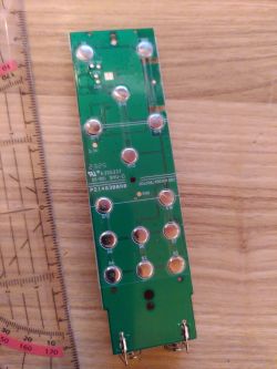 Ledvance Remote Control Circuit Board A circuit board with trace markings and solder points.