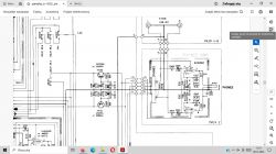 Schemat obwodu elektronicznego z oznaczeniami elementów takich jak tranzystory i kondensatory.