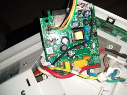 PCB with ESP32 and connected wires inside a heater casing