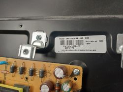 VES430QNDA model label on metal panel with part of a circuit board