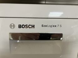 Close-up of a white appliance panel with BOSCH logo and “EcoLogixx 7 S” text
