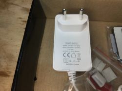 White Power Supply JKY0918-1201500E White power supply with European plug, model JKY0918-1201500E.