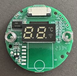 WiFi thermostat circuit board with digital display.
