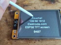 ESP32 TFT Touch Screen Interface ESP32 TFT touch screen displaying texts with a stylus.