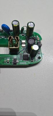 Printed circuit board with capacitors, inductor, and electronic components