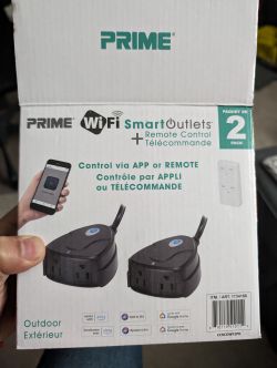 Prime WiFi Smart Outdoor Outlets Packaging Prime WiFi Smart Outdoor Outlets packaging with remote control.