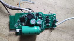 Image of a circuit board with various electronic components and wires connected.
