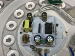 Control module inside the Woox ceiling light showing electronic components.