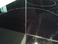 Electrolux EHH6340FXK induction hob blisters under one of the burners Electrolux EHH6340FXK induction hob blisters under one of the burners