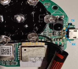 Close-up of the smart IR+RF device S16 PRO circuit board with TX and RX labels.
