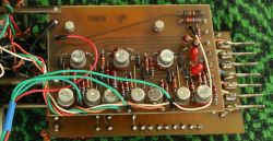 Electronic circuit board with 2N1305 transistors and dense wiring