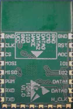 Two E103W electronic modules side by side, showing different pin layouts.