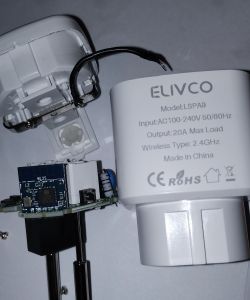 Inside the ELIVCO Model LSPA9 Plug ELIVCO model LSPA9 plug with removed casing, showing internal PCB with WL2S module.
