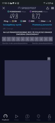 Zrzut ekranu z aplikacji Speedtest na smartfonie, pokazujący prędkość pobierania i wysyłania.