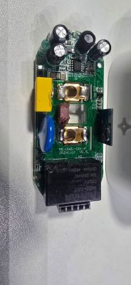 PCB with electronic components including capacitors and a black relay.