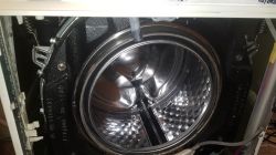 Miele AURIN W3732 - gdzie znaleźć fartuch lub usunąć osad?
