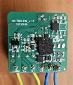 Tuya WiFi Switch Module MK-WD2-002_V1.2 Tuya wifi switch module with visible components and wires.