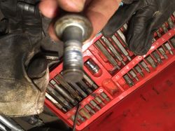 Unscrewing Screws from Brake Yoke: Step-by-Step Guide for Citroen Berlingo Brake Disc Replacement Unscrewing Screws from Brake Yoke: Step-by-Step Guide for Citroen Berlingo Brake Disc Replacement