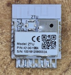 ZTU electronic module with QR code and technical markings on a white label.