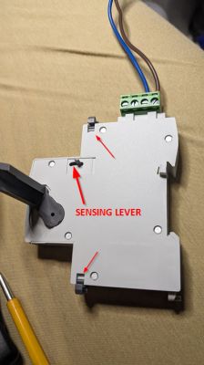 Circuit Breaker Box with Sensing Lever Circuit breaker box with a sensing lever on the casing.