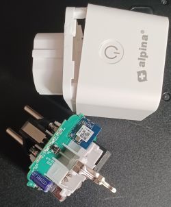 Dismantled Alpina Smart Plug Dismantled Alpina smart plug with visible CB2S WiFi board.