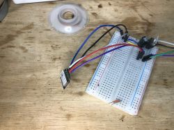 ESP8266 WiFi Module on Breadboard Close-up of ESP8266 WiFi module on a breadboard.