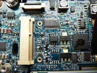HP 6910p Laptop: Power System Issue, Burned Component, UMTS Card Sticker Area