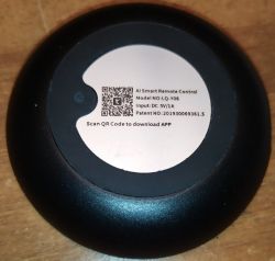 Photo of a black device with a label AI Smart Remote Control, model LQ-Y06, featuring a QR code for app download.