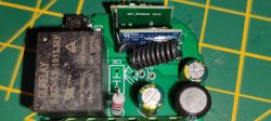 Circuit Board with Electronic Components and Antenna Top view of a circuit board with electronic components and a coil antenna.