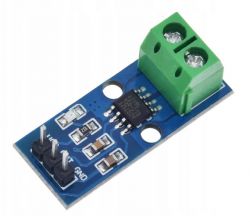 ACS712 measurement module with green screw terminal and pins.