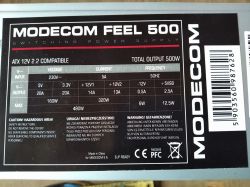Tabliczka znamionowa zasilacza MODECOM FEEL 500 z informacjami technicznymi.