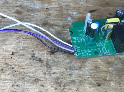 Sonoff Dual R2 with Connected Wires Sonoff Dual R2 circuit board with connected wires.