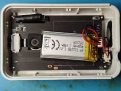 Interior of an electronic device showing a 3.7V Li-Po battery and circuit board