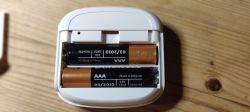 View of AAA batteries in an electronic device