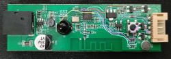 Electronic module with visible components and colored traces