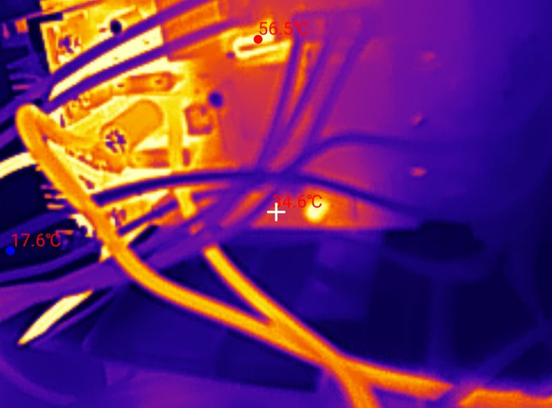 Thermal image of device interior with wires and PCB, markers show 56.5°C, 34.6°C and 17.6°C