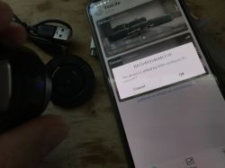 Smartphone showing YSX Lite app with pop-up to configure Wi-Fi camera connection
